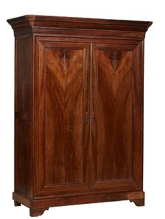 French Provincial Carved Walnut Louis Philippe Armoire, 19th c., the stepped rounded corner crown over double doors, on a plinth base with bracket fee