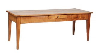 French Provincial Carved Cherry Farmhouse Table, 20th c., the rectangular top over a wide skirt with one end frieze drawer and a frieze drawer on one 
