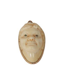 Carved Ivory and 18K Yellow Gold Woman's Face Pendant, 19th c., with inset cabochon emerald eyes, H.- 1 1/2 in., W.- 3/4 in., D.- 5/8 in.