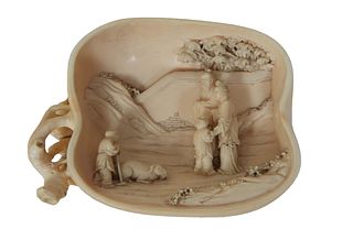 Chinese Carved Ivory Apple, 20th c., with figural and landscape decoration, H.- 3 3/8 in., W.- 4 1/2 in., D.- 1 1/2 in.