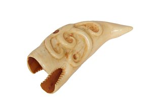 Carved Ivory Octopus on Whale Cane Handle, early 20th c., H.- 1 1/2 in., W.- 4 1/2 in., D.- 1 in.