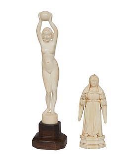 Two Carved Ivory Pieces, 20th c., of an nun holding a torch; the second a nude volleyball player, mounted on an octagonal mahogany plinth, Volleyball-
