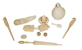 Group of Twelve Ivory Pieces, 20th c., consisting of a carved bird signed Norelkapp; an alligator carved boars tooth; a darning egg; two figural hair 