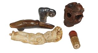 Group of Five Pieces, one an ivory female nude handle, on agate and gold plated cigar holder handle; a silverplated elephant handle; a carved antler w