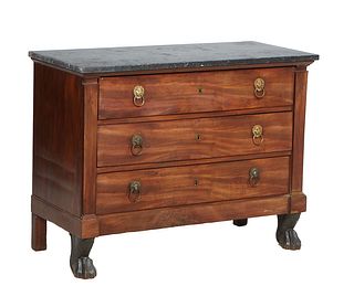 French Empire Style Carved Walnut Marble Top Commode, 19th c., the rectangular highly figured black marble over three setback deep drawers flanked by 