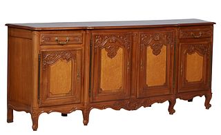 French Provincial Carved Cherry Louis XV Style Sideboard, 20th c., the rounded serpentine parquetry inlaid top over double center fielded panel cupboa