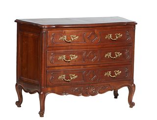 French Louis XV Style Carved Cherry Bowfront Commode, 20th c., the ogee edge serpentine top over three bowed drawers flanked by rounded edge pilasters