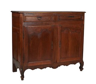 French Provincial Louis XV Style Carved Cherry Sideboard, 19th c., the canted corner rounded edge three band top over two setback frieze drawer and do