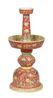 Unusual Chinese Porcelain Bajixiang Porcelain Candlestick, 20th c., with a tapered candlestick over a circular drip tray, on a bell form base, with re