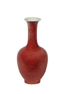 Chinese Pale Red Porcelain Bottle Vase, 20th c., with a long neck with an everted rim, the underside with a six character underglaze blue mark, H.- 8 
