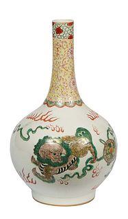 Large Chinese Porcelain Baluster Vase, 20th c., the long tapered floral decorated neck over a body with dragon decoration, the underside with a red si