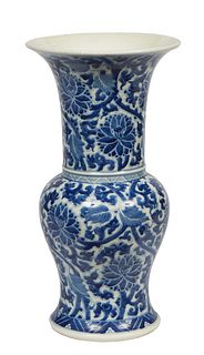 Chinese Porcelain Baluster Vase, with an everted rim over a baluster waist, with blue and white floral decoration overall, H.- 14 1/4 in., Dia.- 7 3/8