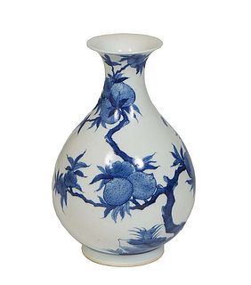 Chinese Blue and White Baluster Vase, 20th c., with fruit and leaf decoration, the underside with a six character blue underglaze mark, H.- 12 1/2 in.