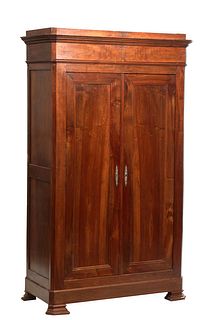 French Provincial Louis Philippe Carved Walnut Armoire, 19th c., the stepped canted corner crown over double doors, on a plinth base, on ogee block fe