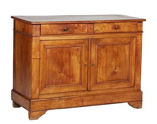 French Provincial Louis Philippe Carved Walnut Sideboard, 19th c., the reeded edge rounded corner top over two frieze drawers, above double setback cu