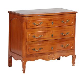 French Carved Cherry Louis XV Style Bowfront Commode, early 20th c., the stepped serpentine top over three bowed drawers, on scrolled cabriole legs jo