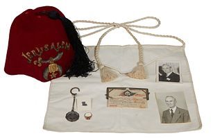 Six New Orleans Masonic Pieces, consisting of a tie tack in the shape of Louisiana; a silvered and enamel BPOE identification card holder; a fez; a cl
