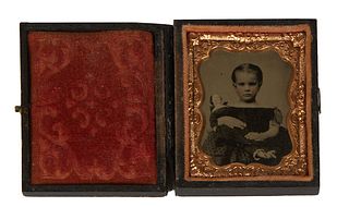 Tintype, 19th c., of a child with a doll, presented on a gutta perchan case, Case- H.- 3 in., W.- 2 1/2 in., D.- 3/4 in.