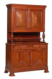 French Provincial Carved Oak Louis Philippe Buffet a Deux Corps, 19th c., the stepped crown over double fielded panel doors on urn form supports flank