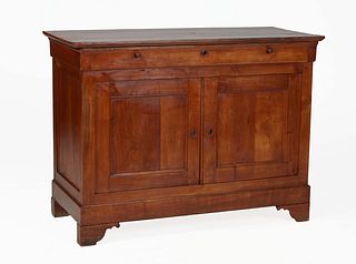 French Provincial Louis Philippe Carved Cherry Sideboard, 19th c., the rounded corner four board top over a long frieze drawer above double cupboard d