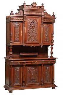 French Provincial Henri II Style Carved Walnut Buffet a Deux Corps, c. 1880, the egg and scroll carved crest on a pierced frieze flanked by finials, o