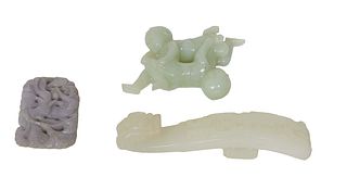 Three Pieces of Carved Jade, 20th c., consisting of a dragon form buckle; a carved figure of two babies; and a pierced pendant, Buckle- H.- 4i in., W.