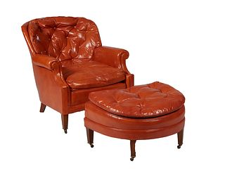 Upholstered Armchair, the canted arched back over tufted rolled arms and a removable seat cushion, on tapered square legs with ormolu sabots on roller
