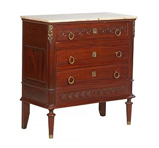 French Louis XVI Style Carved Walnut Marble Top Commode, 20th c., the ogee edge cookie corner white marble over three setback frieze drawers above two