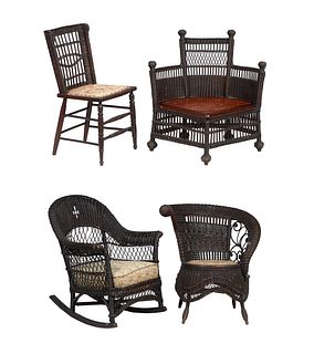 Group of Four Woven Wicker Chairs, early 20th c., consisting of a rocker with a cushioned seat; an armchair by Jenkins-Phipps Co. with a circular cush