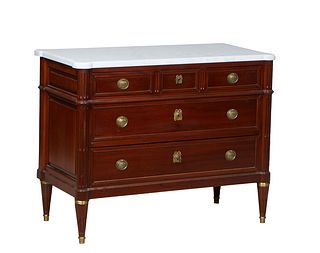 French Louis XVI Style Carved Walnut Marble Top Commode, 20th c., the stepped ogee edge cookie corner top over three frieze drawers and two deep drawe