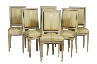 Set of Six French Louis XVI Style Polychromed Dining Chairs, 20th c., the canted rectangular upholstered back to a trapezoidal cushioned seat, on tape