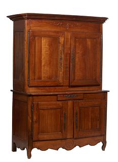 French Louis XV Style Carved Cherry Buffet a Deux Corps, 19th c., the stepped ogee crown over double arched two panel doors with iron fiche hinges and