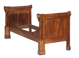 French Empire Style Bronze Mounted Mahogany Day Bed, 19th c., the rolling pin top head and foot board with bronze end mounts, over engaged columns, jo