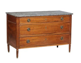 French Louis XVI Style Carved Walnut Commode, 19th c., the rounded corner highly figured reeded edge gray marble over three graduated drawers, on a pl