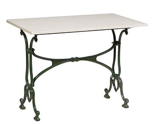 French Parisian Marble Top Iron Bistro Table, 20th c., the beige rectangular marble on iron trestle supports, joined by a curved X-form stretcher, H.-