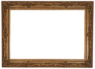 Massive Antique Style Gilt Frame, 20th c., with relief scroll and floral decoration, Sight H.- 47 1/8 in., W.- 71 1/4 in., Full Frame H.- 64 in., W.- 