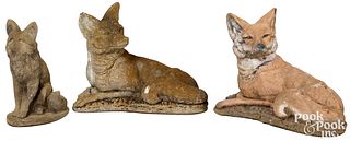 Three aggregate fox garden figures