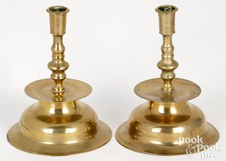 Pair of brass bell base candlesticks, early 18th c