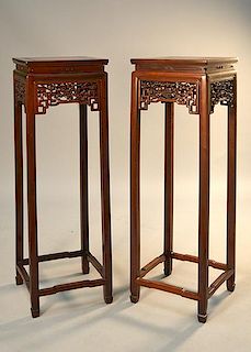 Pair of Chinese carved rosewood tall stands, 20th C.