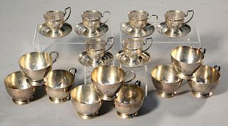 Nine Stieff sterling punch cups, with six sterling demitasse frames, and underplates