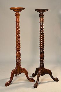 Two similar mahogany turned pedestals, rope turned column