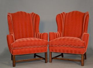 Pair of orange red upholstered Chippendale wing chairs