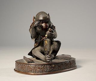 Japanese Meiji period bronze seated monkey inspecting his inro