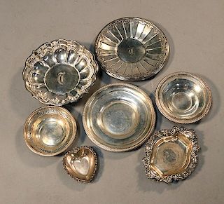 Seven sterling bowls and plates 31 ozs