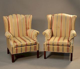 Pair 20th Chippendale style mahogany wing chairs molded leg, shaped crest, yellow striped upholstery 39"H x 31 1/2"W