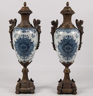 PAIR OF FRENCH STYLE PORCELAIN CAPPED URNS