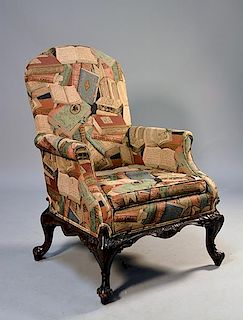 Good early 20th C. mahogany wing chair with book upholstery
