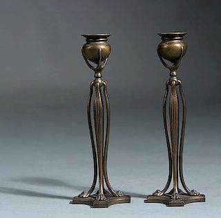 Pair of Tiffany Studios bronze candlesticks with paw feet