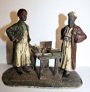 Cold painted bronze depicting scholars