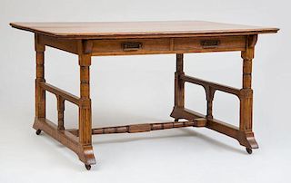 AESTHETIC MOVEMENT TWO-DRAWER OAK LIBRARY TABLE